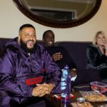 Judges watching a monitor together in a green room