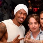 Group of three smiling at a nightclub party